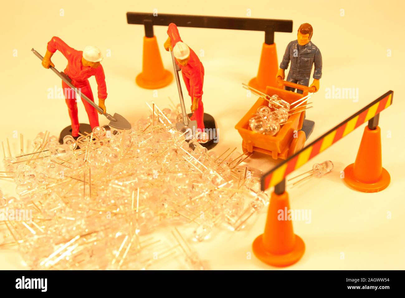 A team of skilled electrical engineers work together to repair broken components. Stock Photo