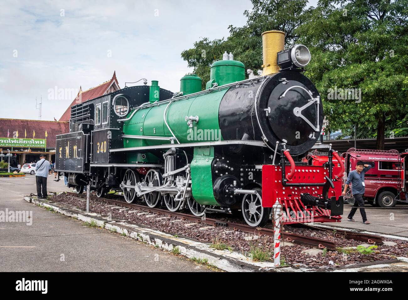 Preserved steam locomotive on static display outside railway station at Chiang Mai, Thailand Stock Photo