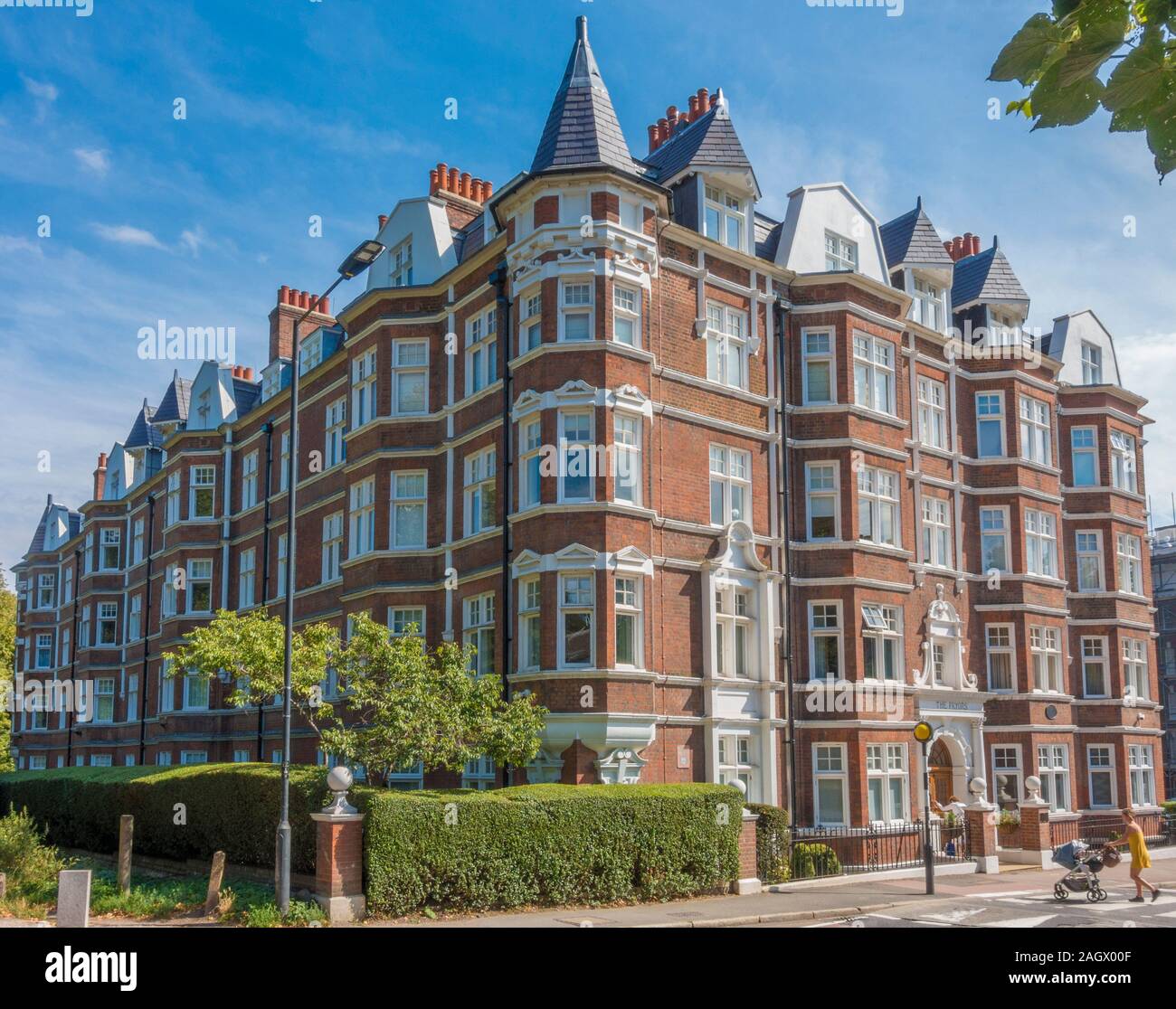 An elegant mansion block of flats ‘The Pryors’, sunlit against a blue sky. Located next to Hampstead Heath, in Hampstead, London, NW3, England, UK. Stock Photo