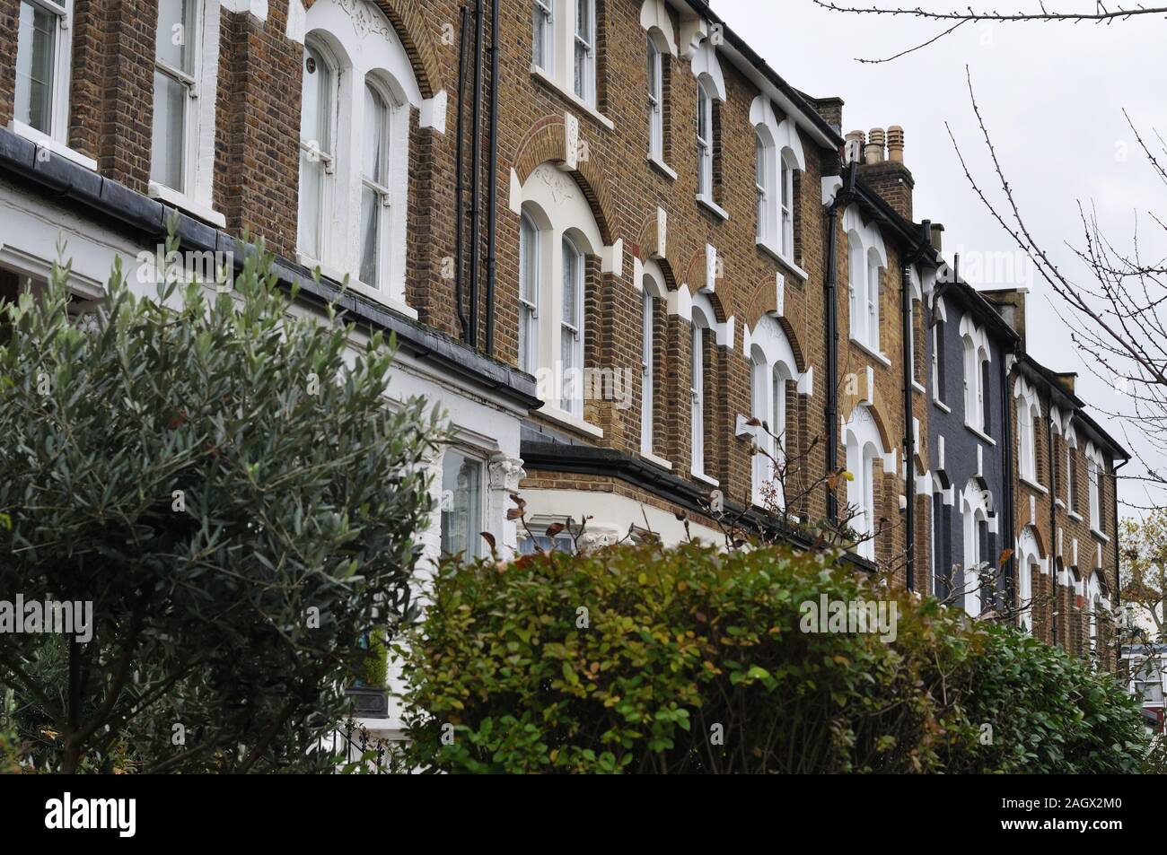 victorian town houses with brick facades built in rows in the district