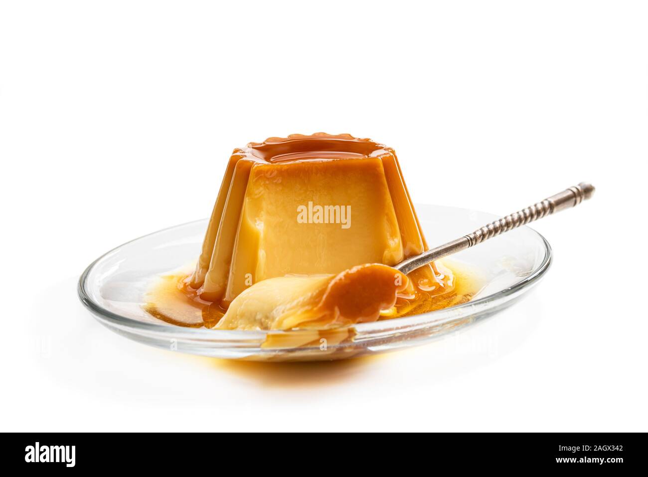 Creme caramel custard pudding isolated in white Stock Photo - Alamy