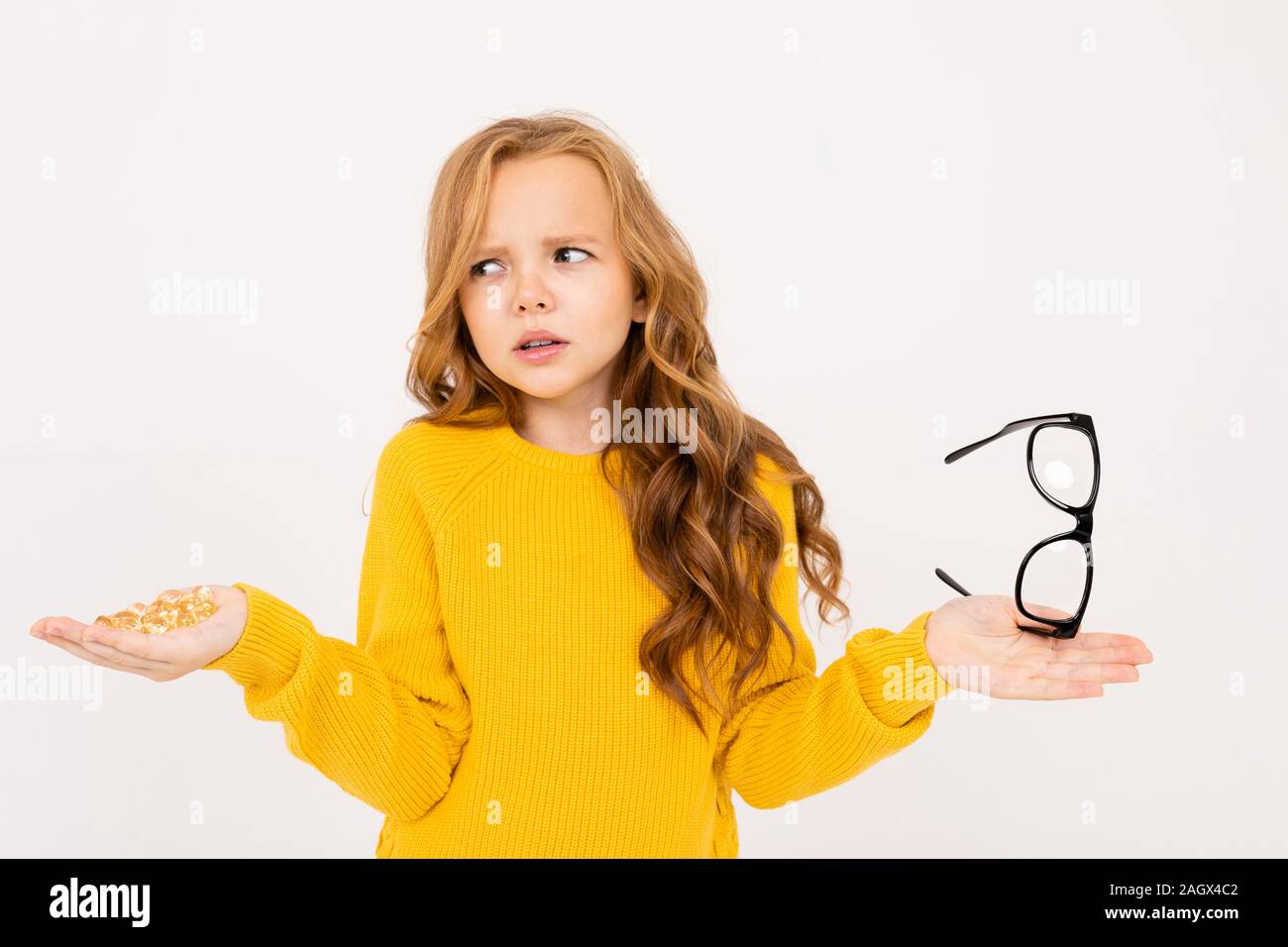 Happy Teenager Girl With Red Hair Hoody And Yellow Trousers Posing