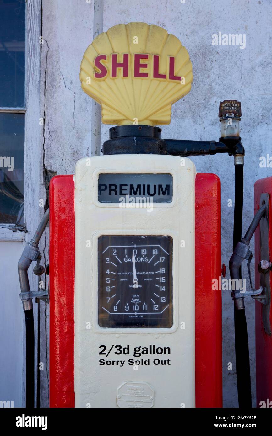 Classic old-fashioned Shell petrol pump and sign at St Mawes, Cornwall, United Kingdom Stock Photo