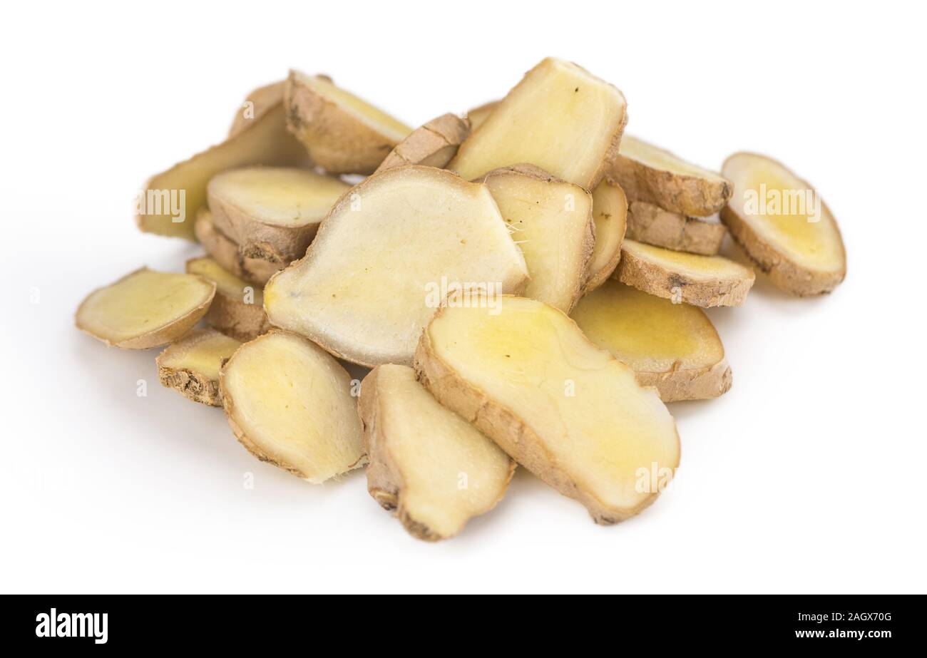 Ginger Slices isolated on white background (selective focus; close-up shot) Stock Photo