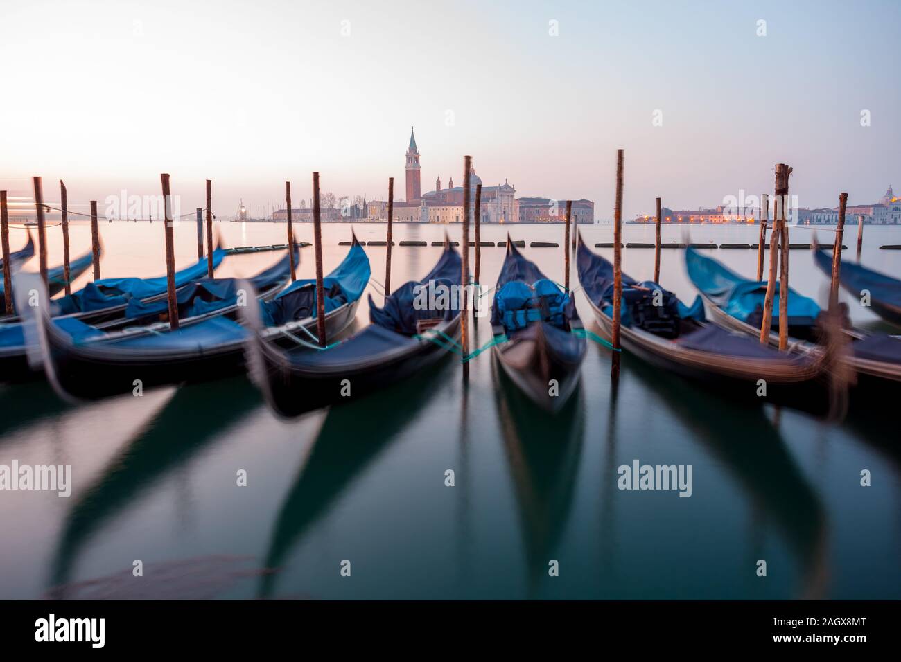 Sunrise at Venice with gondola and island of st george view Stock Photo ...