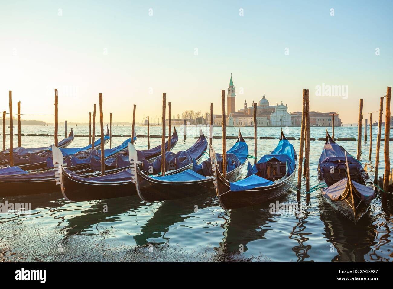 Sunrise at Venice with gondola and island of st george view Stock Photo ...