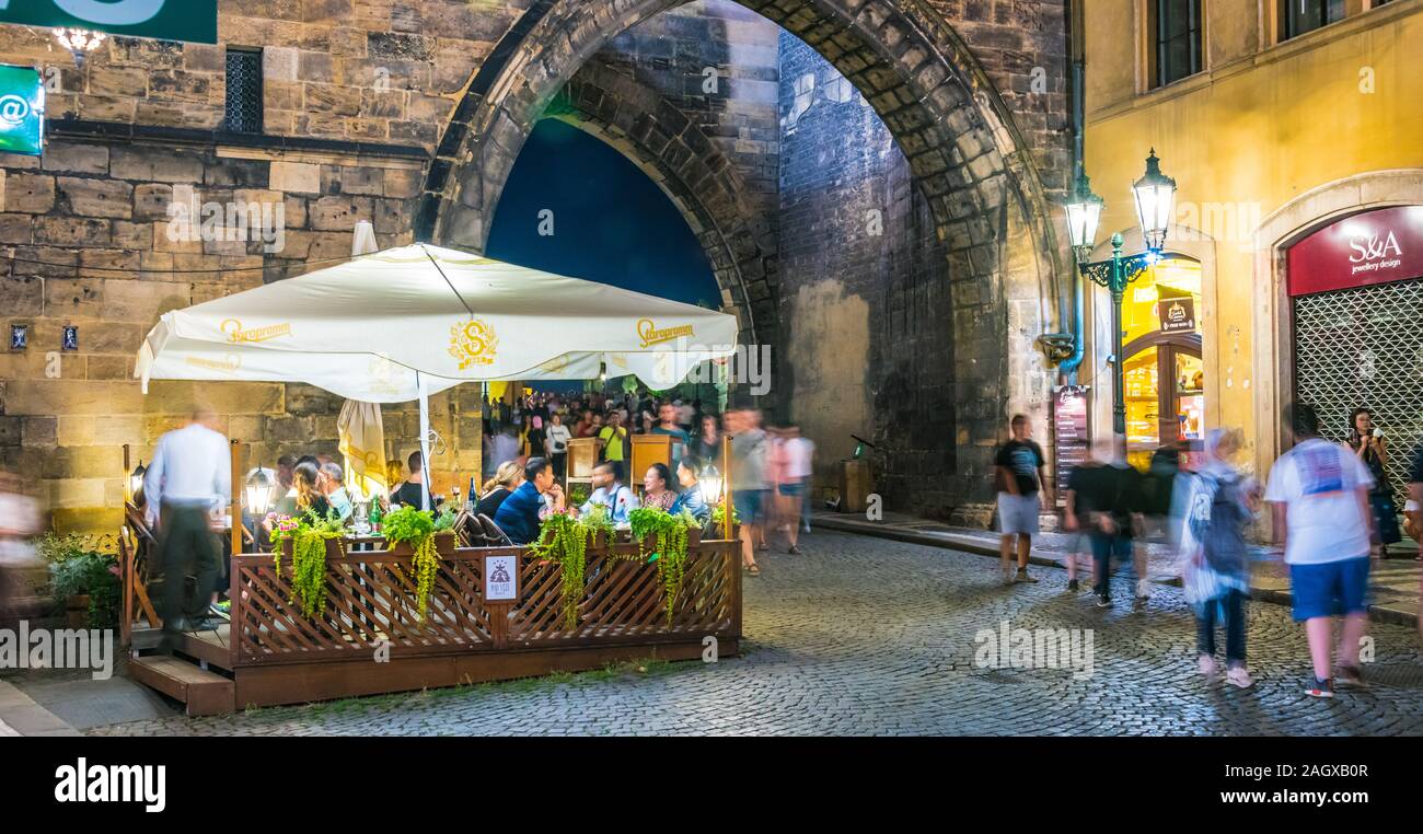 PRAGUE, CZECH REP - AUG 2, 2019: Restaurant patio on Charles Bridge in Prague, Czech Republic Stock Photo
