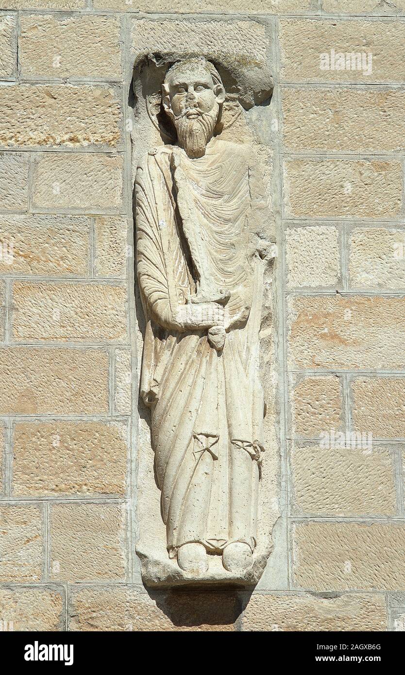 Hight relief of Paul the Apostle (c.5-c.64 or 67). Romanesque style, 12th century. Work of Ramon de Bianya. Church of St. Paul of Narbonne (late 16th century). Anglesola, province of Lleida, Catalonia, Spain. Stock Photo