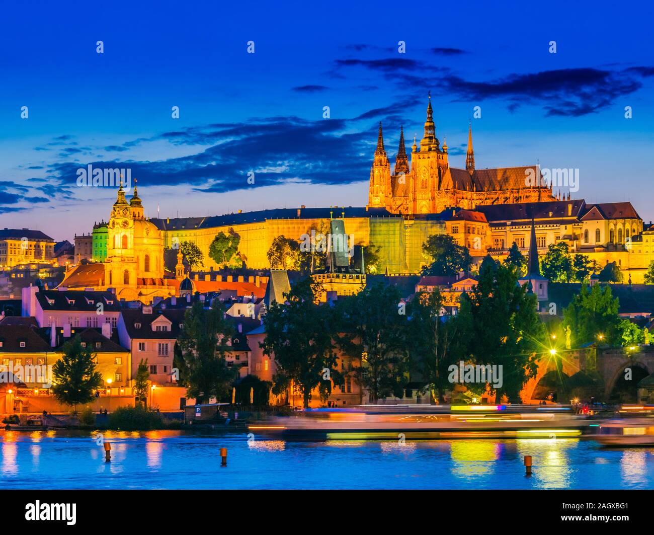 View of Hradcany district in Prague with St. Vitus Cathedral and Prague Castle after sunset. Czech Republic Stock Photo