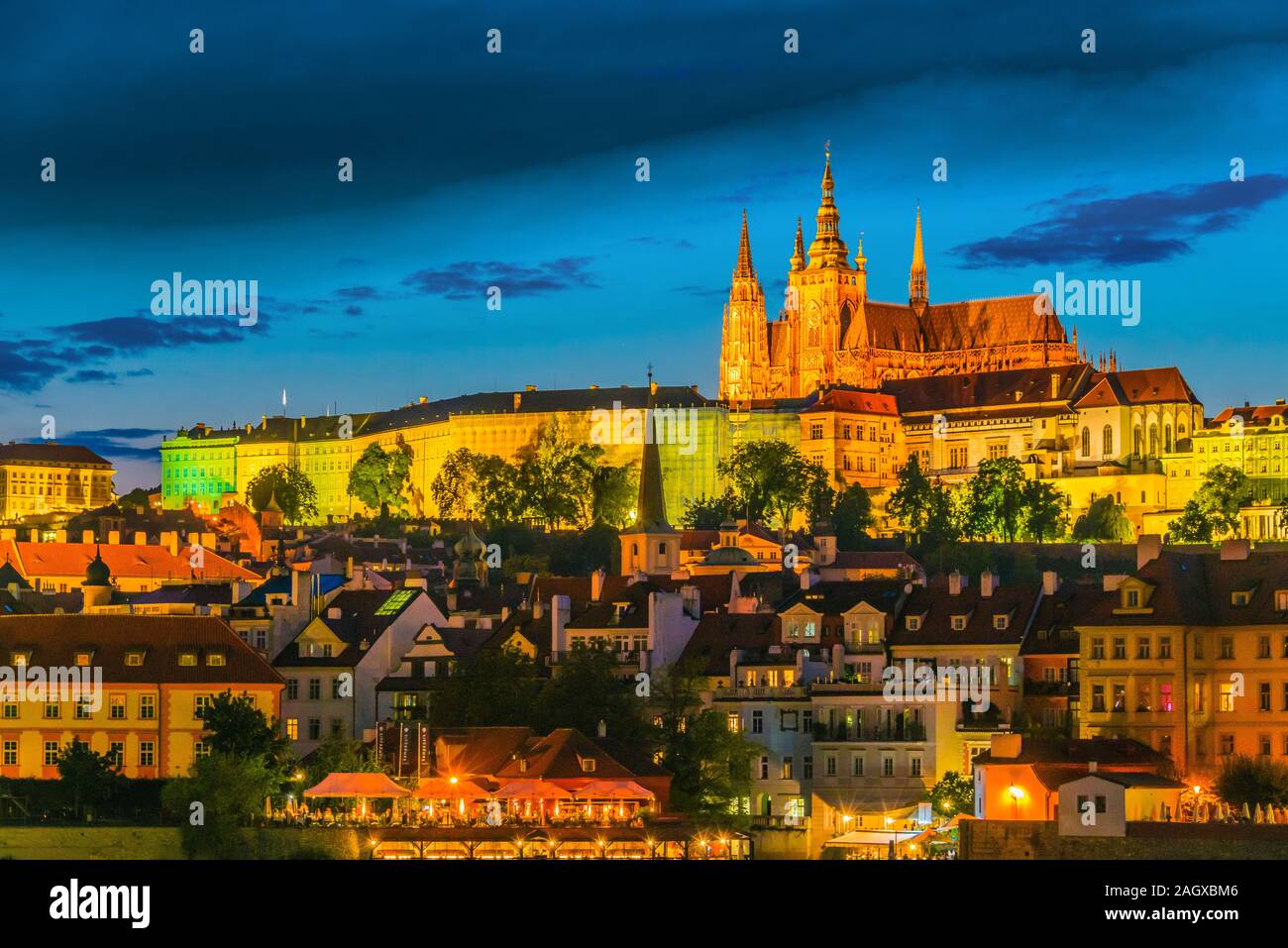 View of Hradcany district in Prague with St. Vitus Cathedral and Prague Castle after sunset. Czech Republic Stock Photo