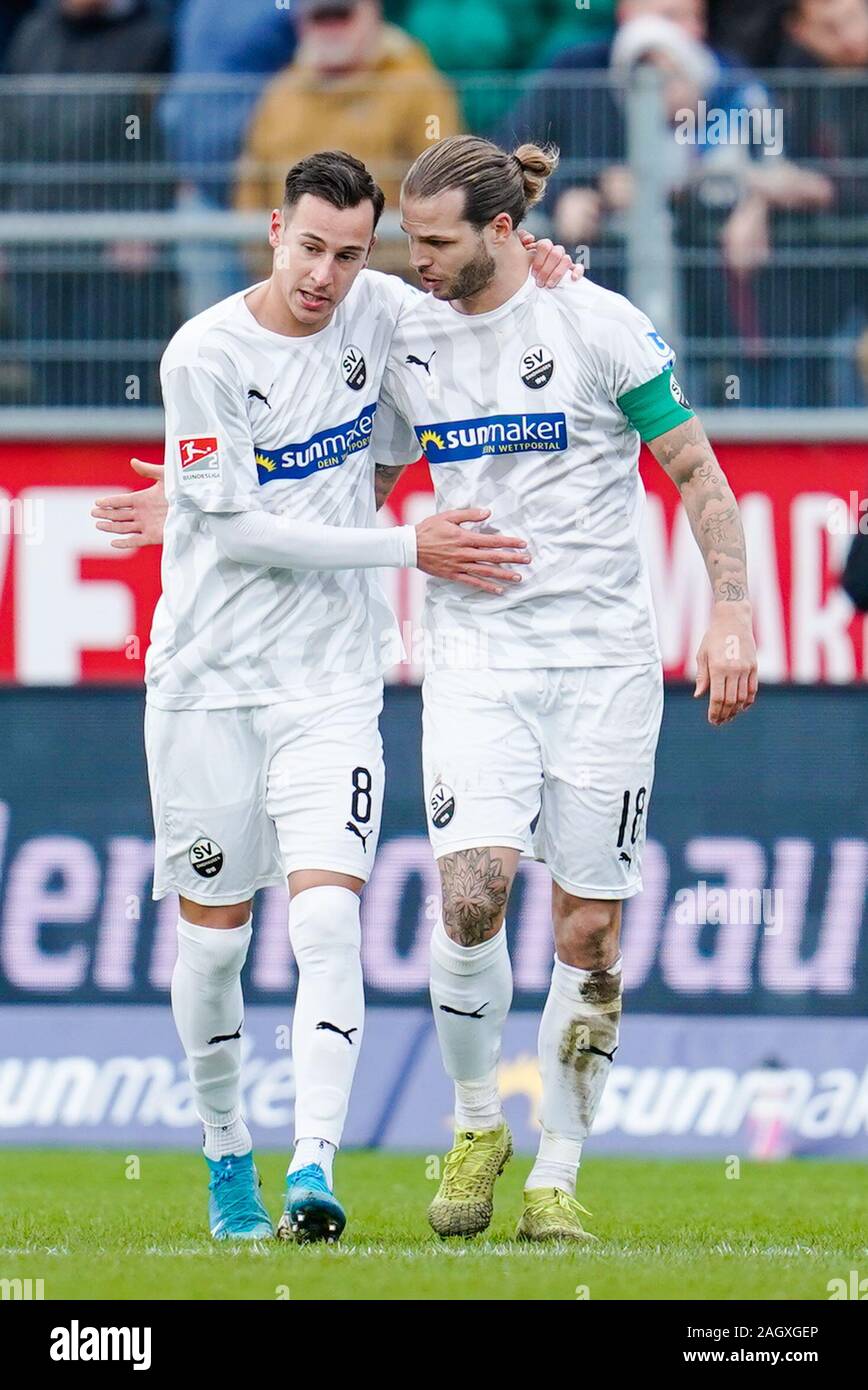 Sandhausen, Germany. 22nd Dec, 2019. Football: 2nd Bundesliga, 18th matchday, SV Sandhausen - Holstein Kiel, BWT-Stadium am Hardtwald. Sandhausen's goal scorer Mario Engels (l) and Sandhausen's Dennis Diekmeier cheer about the goal for 1:1. Credit: Uwe Anspach/dpa - IMPORTANT NOTE: In accordance with the regulations of the DFL Deutsche Fußball Liga and the DFB Deutscher Fußball-Bund, it is prohibited to exploit or have exploited in the stadium and/or from the game taken photographs in the form of sequence images and/or video-like photo series./dpa/Alamy Live News Stock Photo