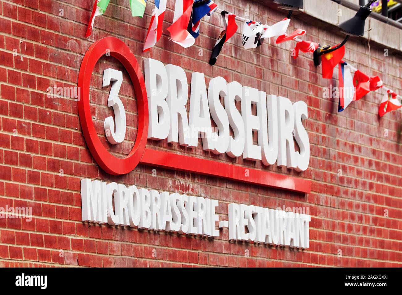 The restaurant sign of Les 3 Brasseurs (the three brewers), a French catering company specialized in microbrewery in Montreal, Canada Stock Photo