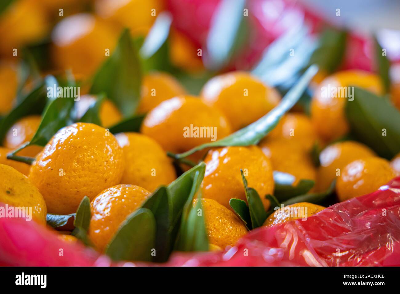 Bunch of fresh tangerines oranges on market Stock Photo
