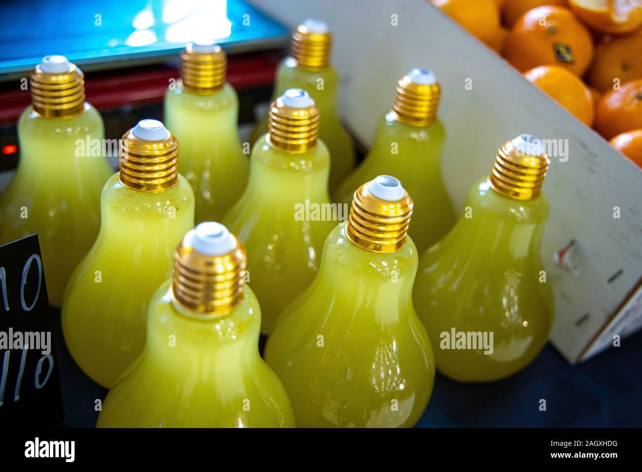 Limoncello Lemon Alcohol typical of Southern Italy. Bottles for sale in a Factory, Naples, Napoli, Italy Stock Photo