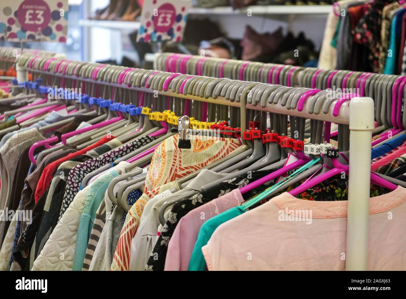 Woman Choosing Clothing In A Second Hand Store. Various Vintage Suede  Leather And Jeans Jackets Hang On Clothing Rack. Thrifting And  Sustainability In Clothing Concept Stock Photo, Picture and Royalty Free  Image.