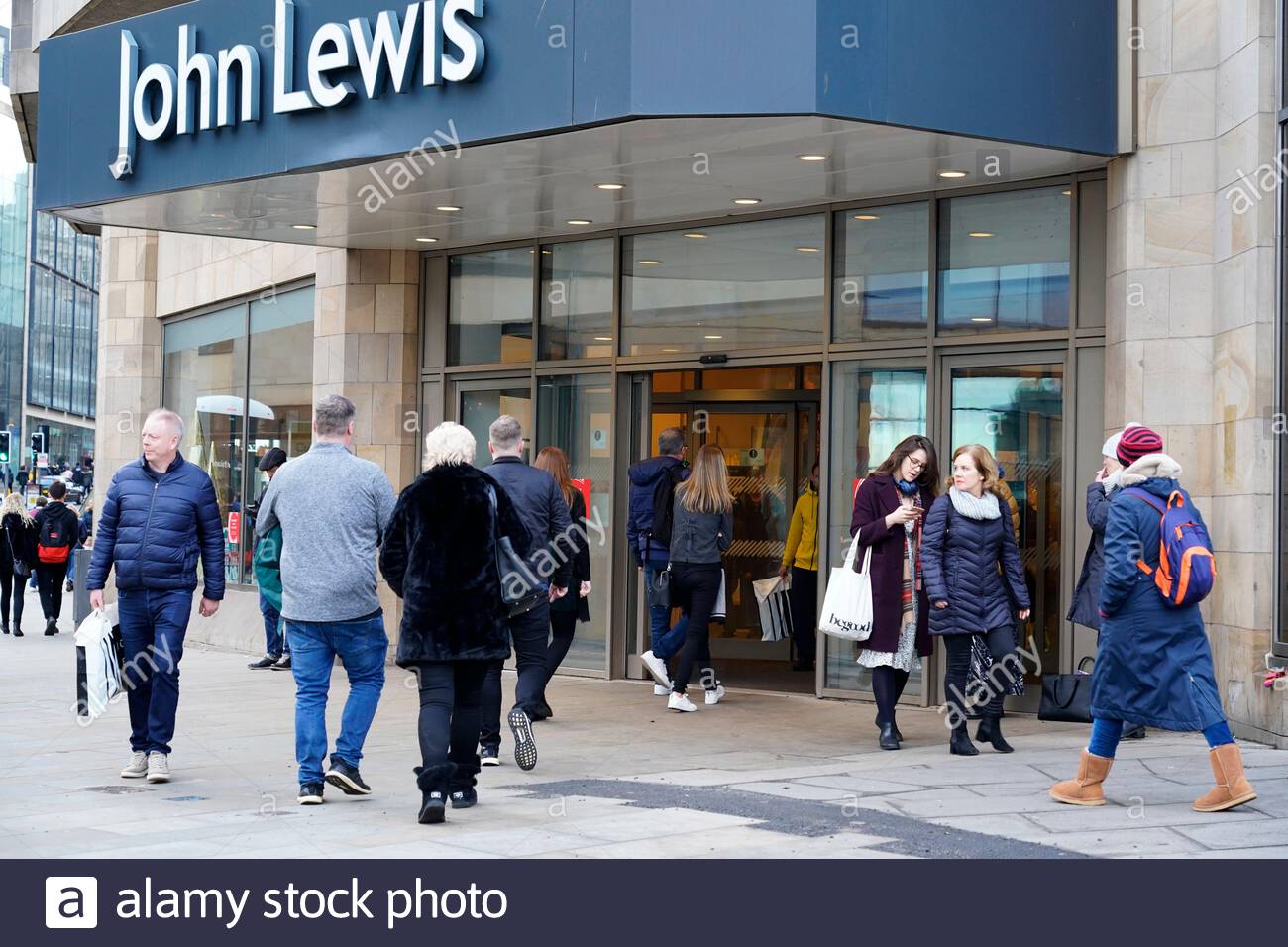 Edinburgh, Scotland, UK. 22nd  Dec 2019. Christmas Shoppers entering and leaving John Lewis department store at the St James Centre, on stampede Sunday for last minute Christmas shopping.  Credit: Craig Brown/Alamy Live News Stock Photo