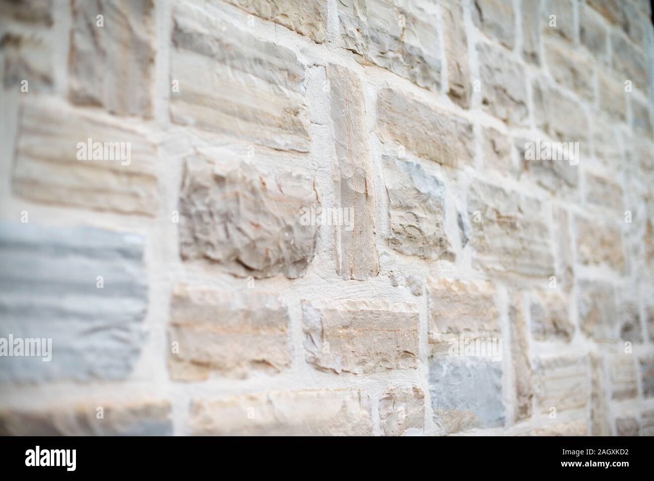 facade made of white limestone bricks Stock Photo