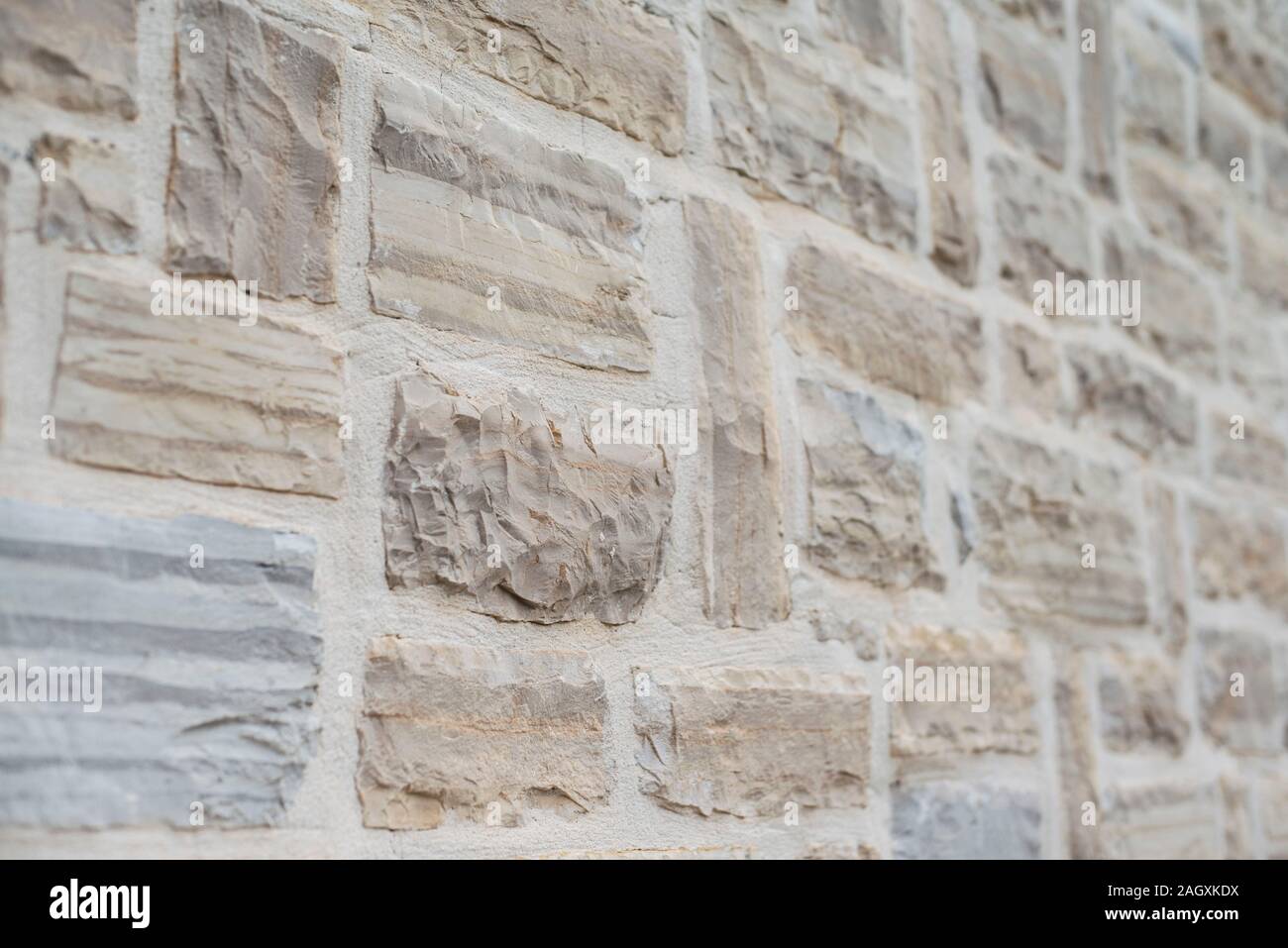 facade made of white limestone bricks Stock Photo
