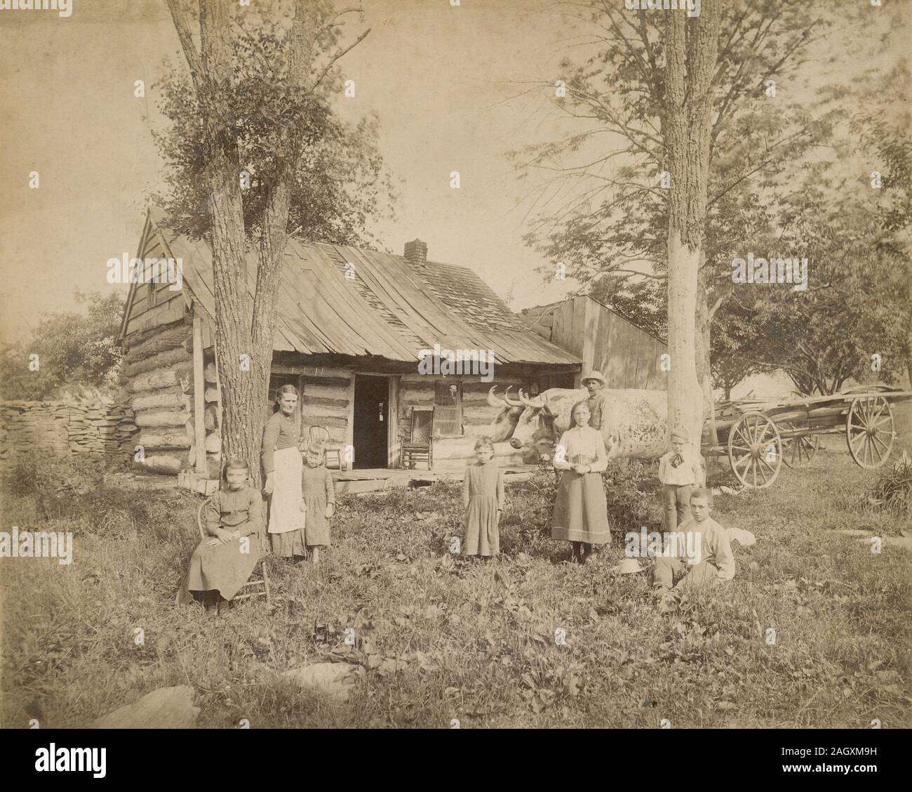 Antique 1890 photograph, “family and home in New York state near Binghamton.” SOURCE: ORIGINAL PHOTOGRAPH Stock Photo
