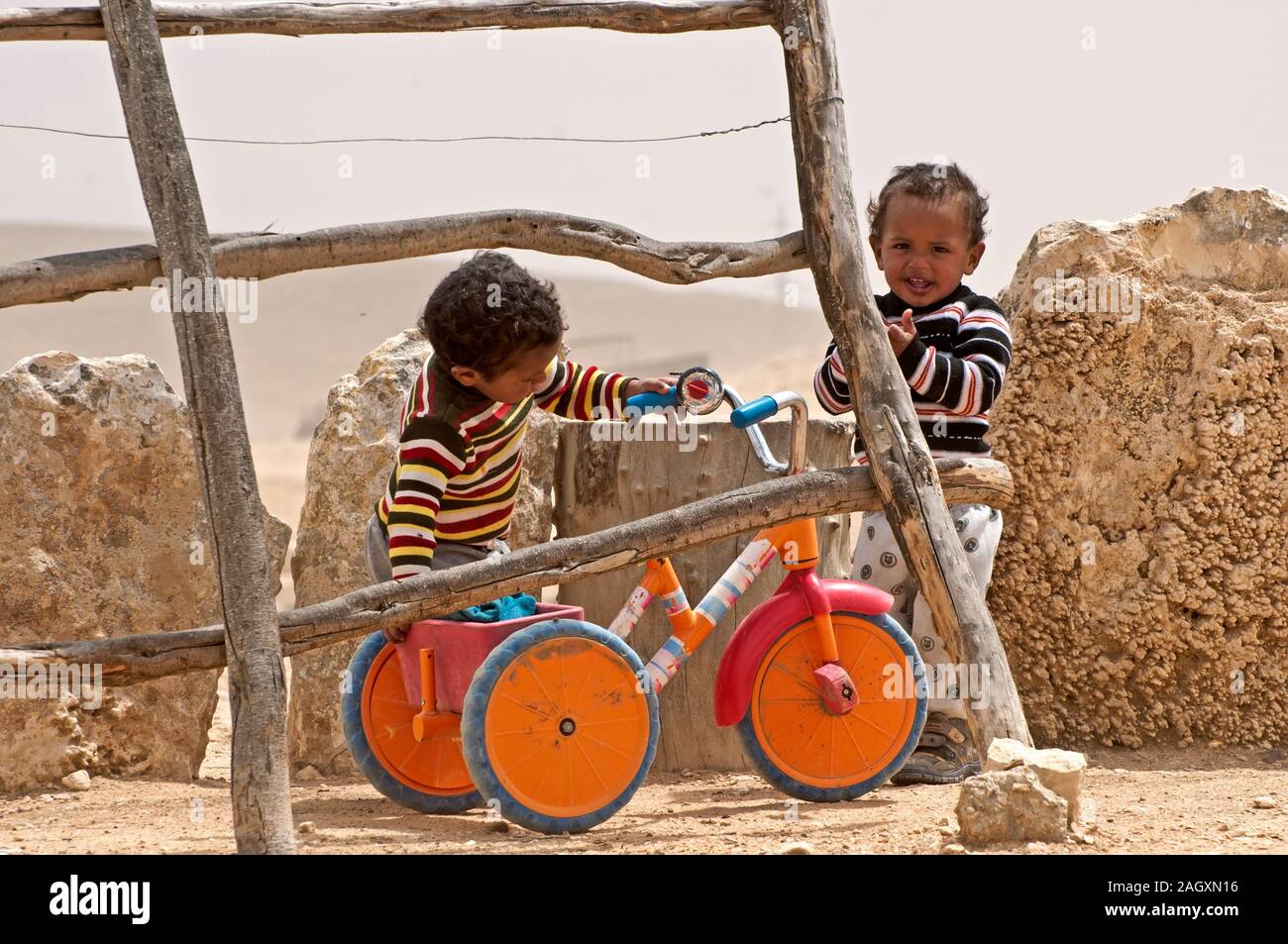 Bedouin kids playing in the yard Stock Photo