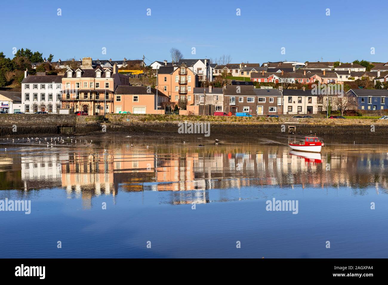Kinsale harbour in County Cork, Ireland with reflections on a calm winter's afternoon Stock Photo