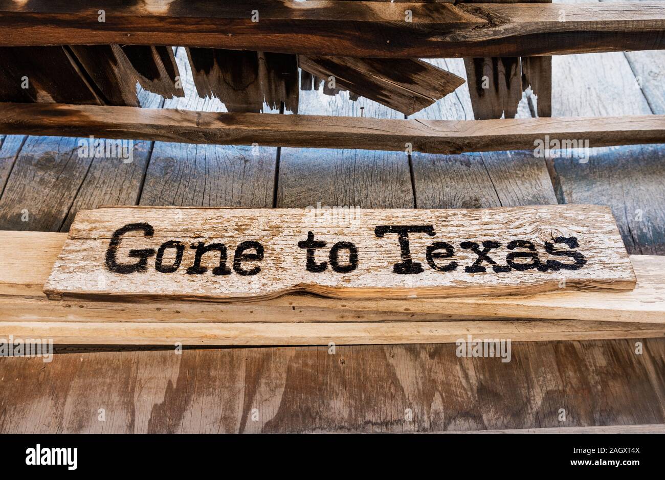Weathered, rustic sign Gone to Texas. Stock Photo