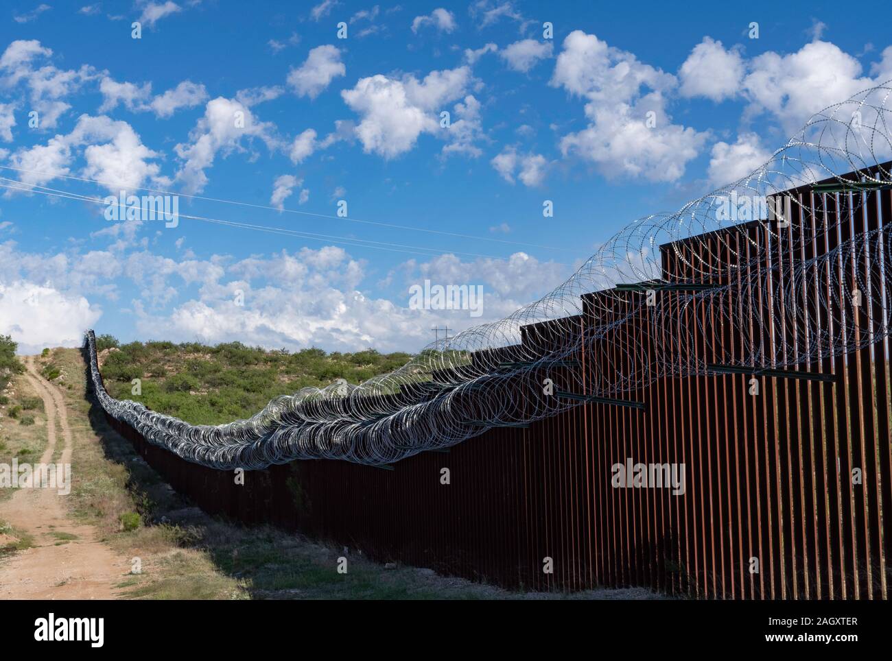 Border wall/fence with concertina wire, Sasabe, Arizona Stock Photo Alamy
