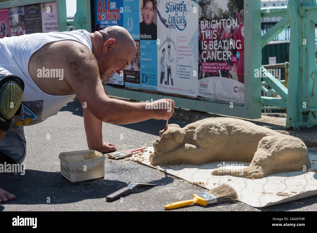 Sand Sculptor, Brighton, UK Stock Photo