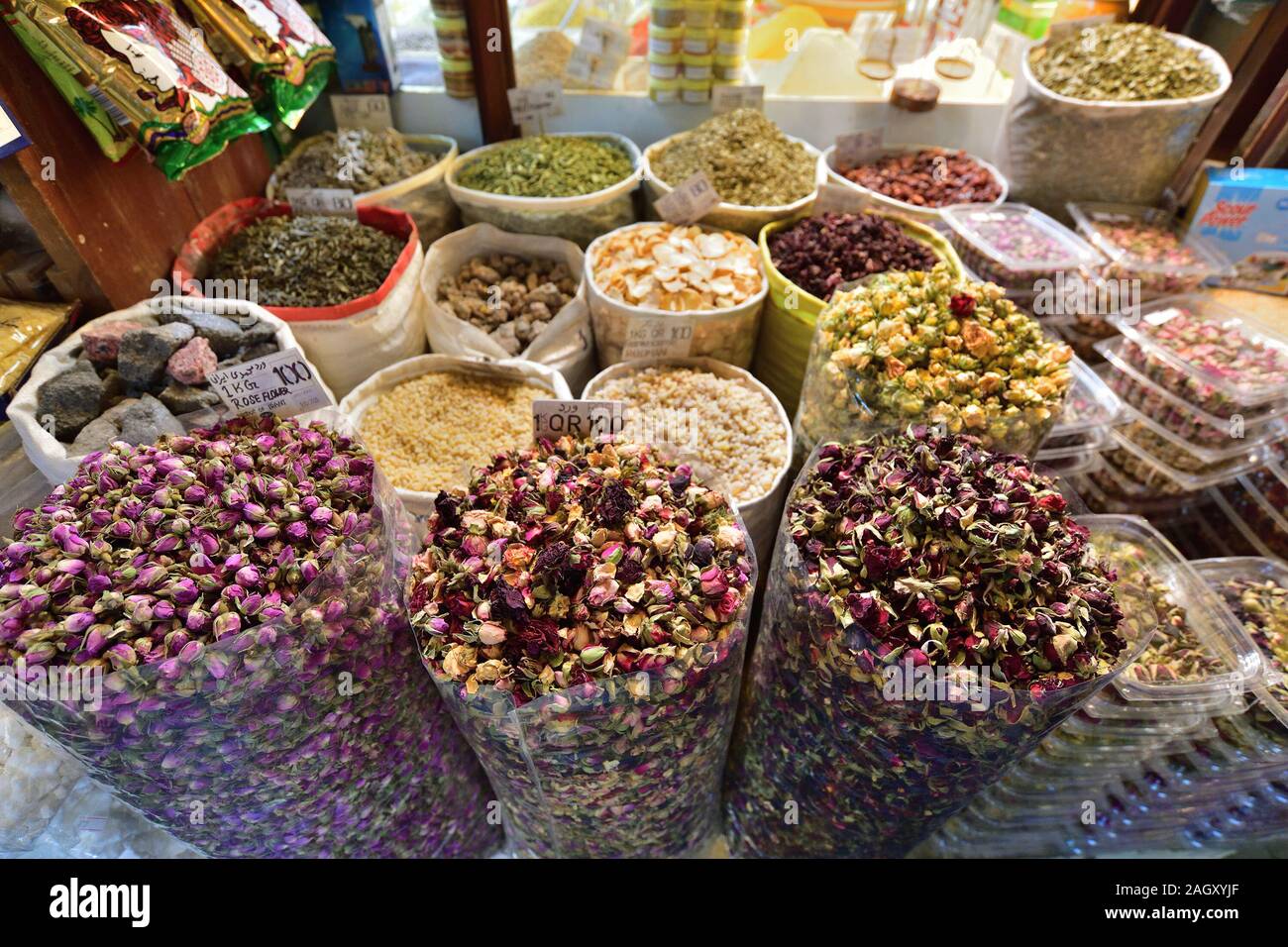 Doha, Qatar - Nov 21. 2019. Dry rose flowers and other spices on Souq Waqif - marketplace for selling traditional garments Stock Photo