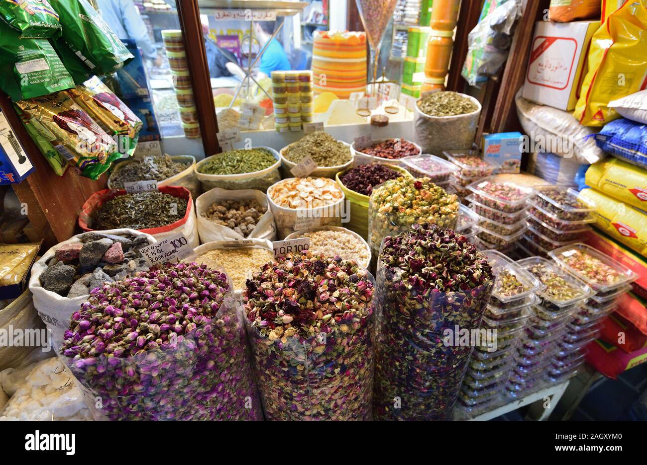Doha, Qatar - Nov 21. 2019. Dry rose flowers and other spices on Souq Waqif - marketplace for selling traditional garments Stock Photo