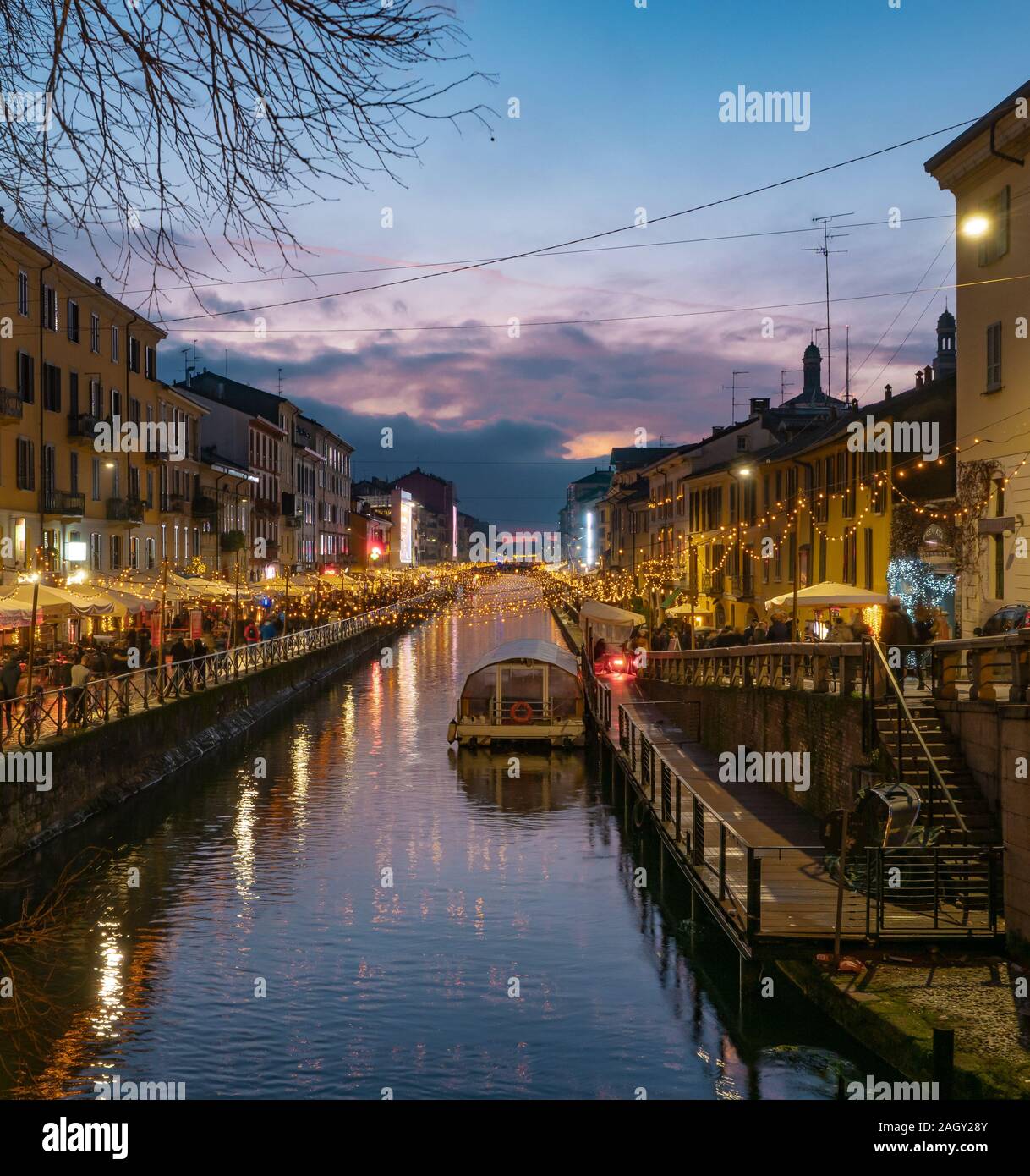 the ancient Navigli district illuminated for the Christmas holidays at sunset. Milan - Italy Stock Photo