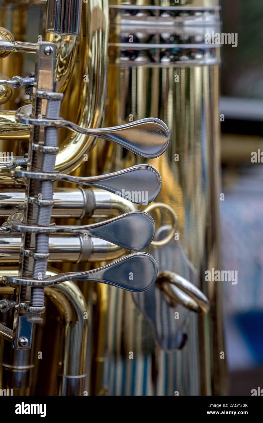 tuba is the lowest-pitched musical instrument in the brass family close up  the valves Stock Photo