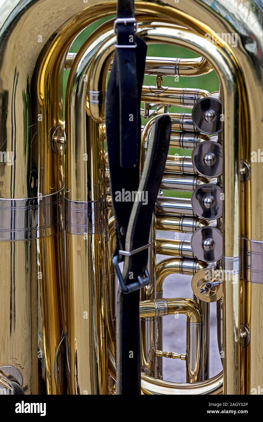 close up part of a golden colored shiny tuba Stock Photo