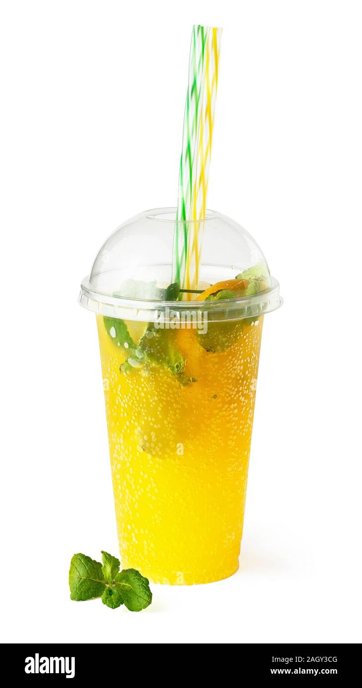 Cooling Orange Lemonade Drink In Plastic Glass With Mint And Sparkling