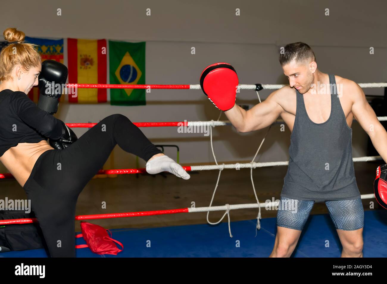 Woman throwing punch hi-res stock photography and images - Alamy