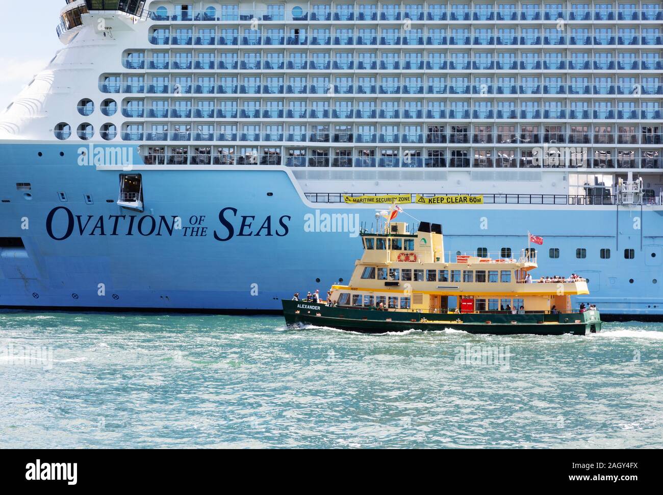 Royal Caribbean International cruise ship, Ovation of the Seas and ferry,  Sydney Harbour, Sydney Australia Stock Photo