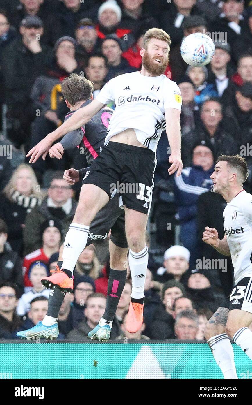 London, UK. 21st Dec, 2019. Tim Ream of Fulham beats Patrick Bamford of Leeds United in the air during the EFL Sky Bet Championship match between Fulham and Leeds United at Craven Cottage, London, England on 21 December 2019. Photo by Ken Sparks. Editorial use only, license required for commercial use. No use in betting, games or a single club/league/player publications. Credit: UK Sports Pics Ltd/Alamy Live News Stock Photo