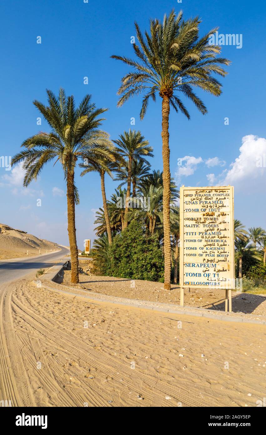 Sign board at the entrance to Saqqara necropolis site near Mwmphis, outside Cairo, Egypt listing the tombs and other attractions Stock Photo