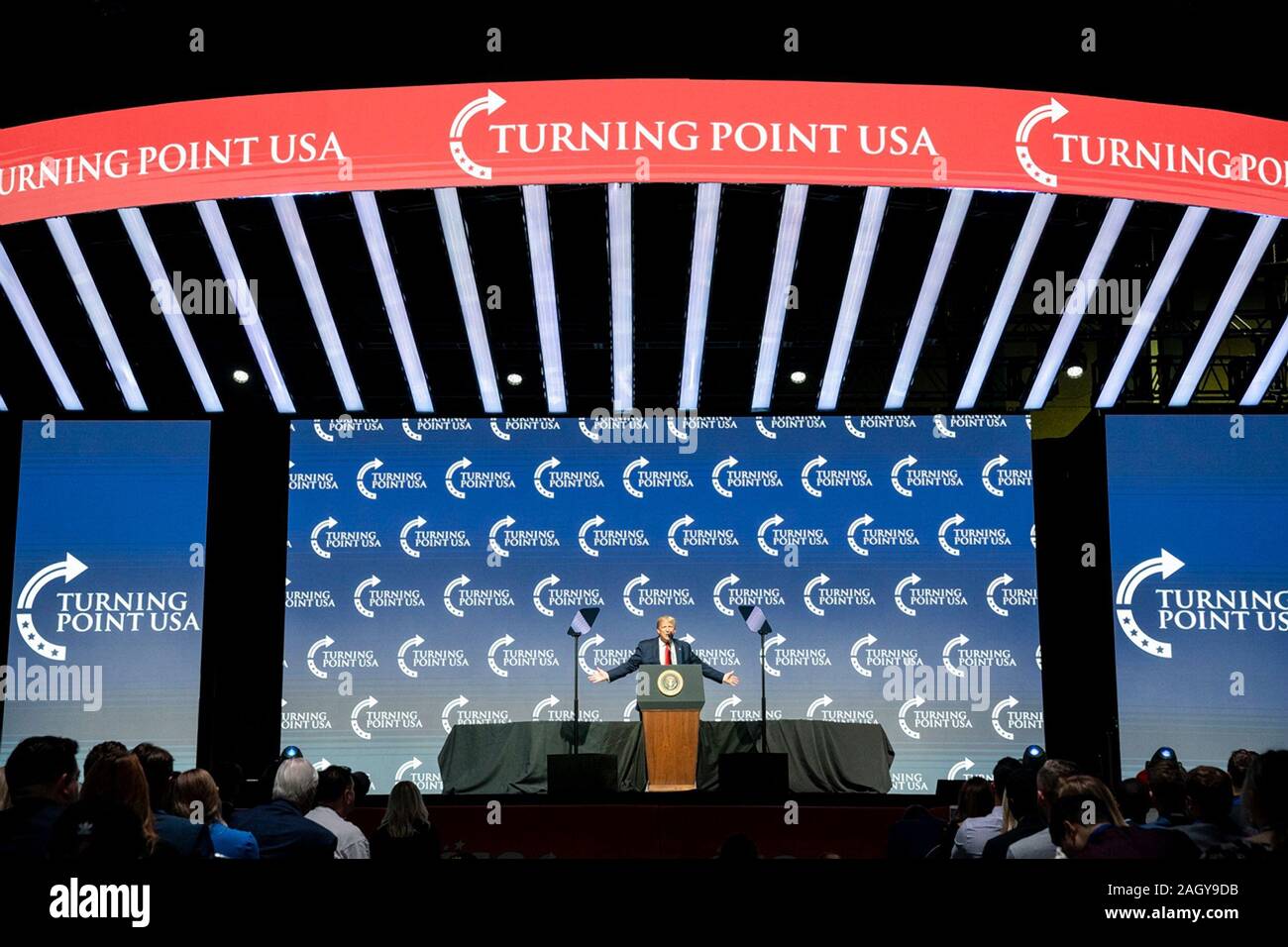 U.S President Donald Trump delivers remarks at the Turning Point USA 5th annual Student Action Summit at the Palm Beach County Convention Center December 21, 2019 in West Palm Beach, Florida. Trump rallied the youth conservative group with wild claims on wind turbines and attacks on his opponents. Stock Photo