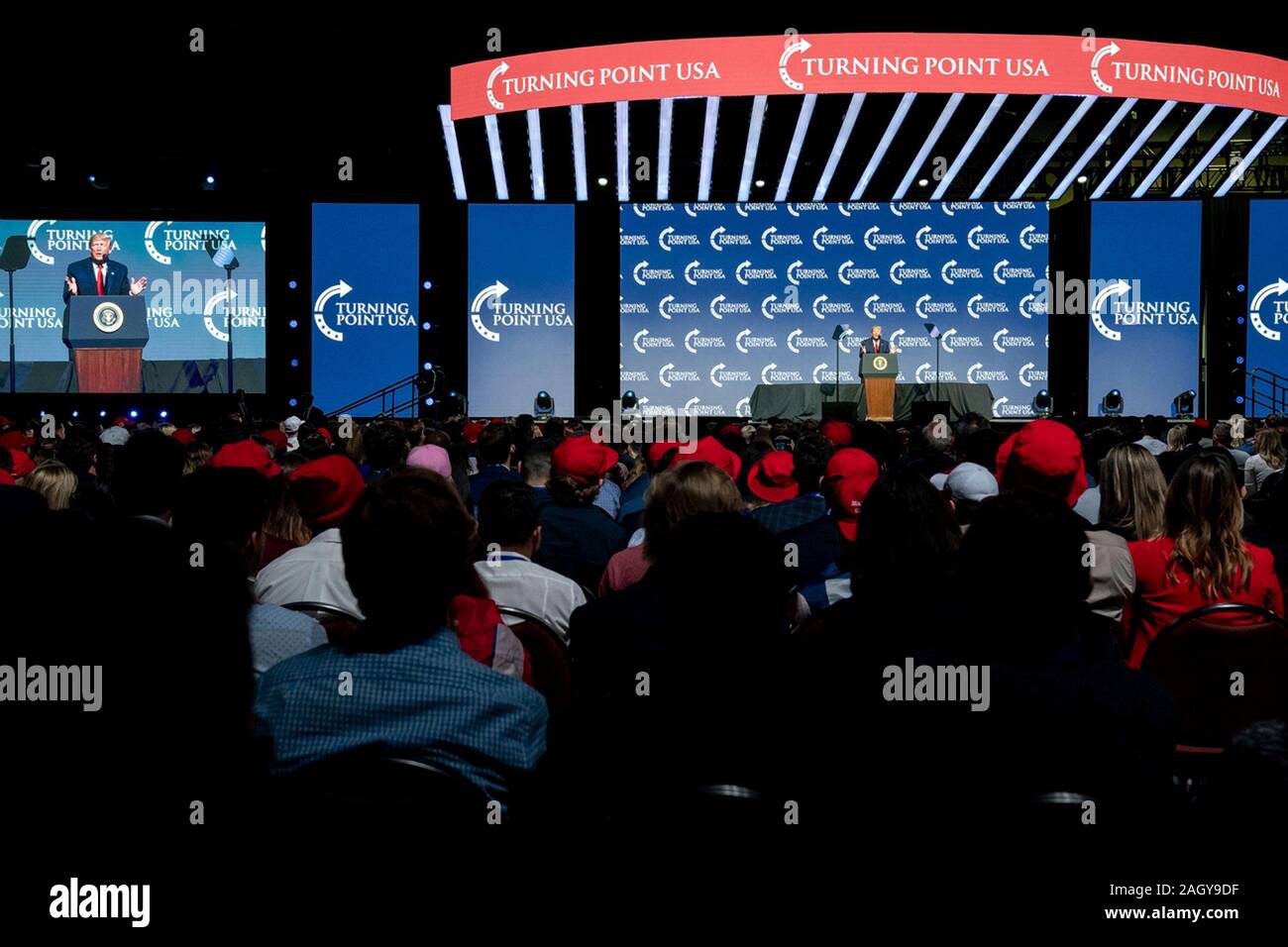 U.S President Donald Trump delivers remarks at the Turning Point USA 5th annual Student Action Summit at the Palm Beach County Convention Center December 21, 2019 in West Palm Beach, Florida. Trump rallied the youth conservative group with wild claims on wind turbines and attacks on his opponents. Stock Photo