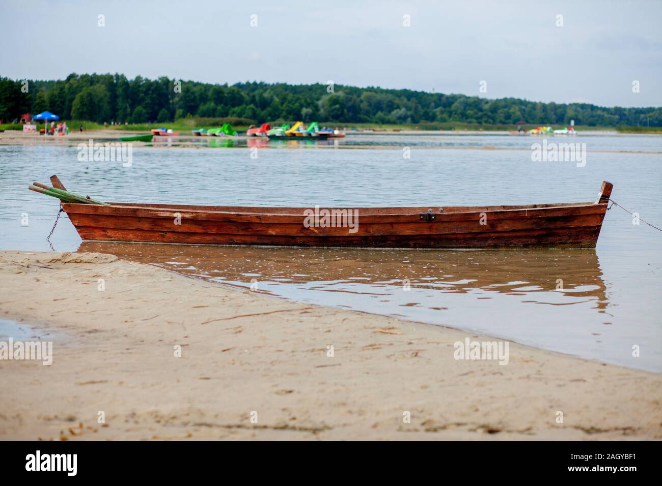 Old fisherman boat at sunrise time on the beach Stock Photo - Alamy