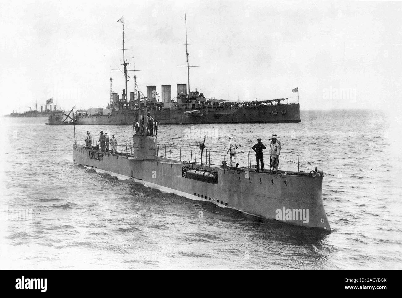 Russian submarine Akula, launched in 1907, first Russian submarine able to cruise long distances. Akula was built for the Imperial Russian Navy. Akula saw service during World War I and sank in November 1915 after hitting a naval mine. Imperial Russian submarine Akula and armoured cruiser Ryurik, 1913 Stock Photo