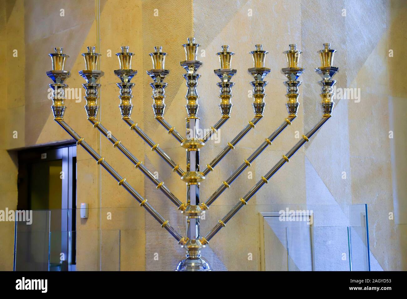 The largest silver Hanukkah, a beautiful candlestick for 9 candles stands in the International Jewish Cultural Religious Center Menorah Stock Photo