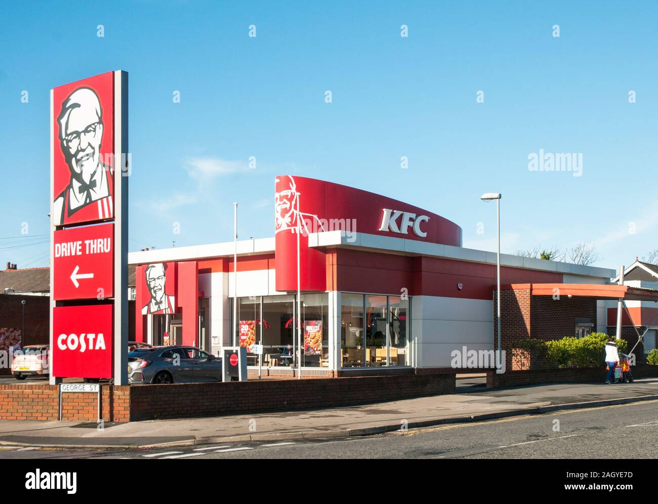Kentucky Fried Chicken KFC Drive Through fast food outlet. First restaurant opened in 1930 by Harland Sanders (Colonel) in Corbin Kentucky USA Stock Photo