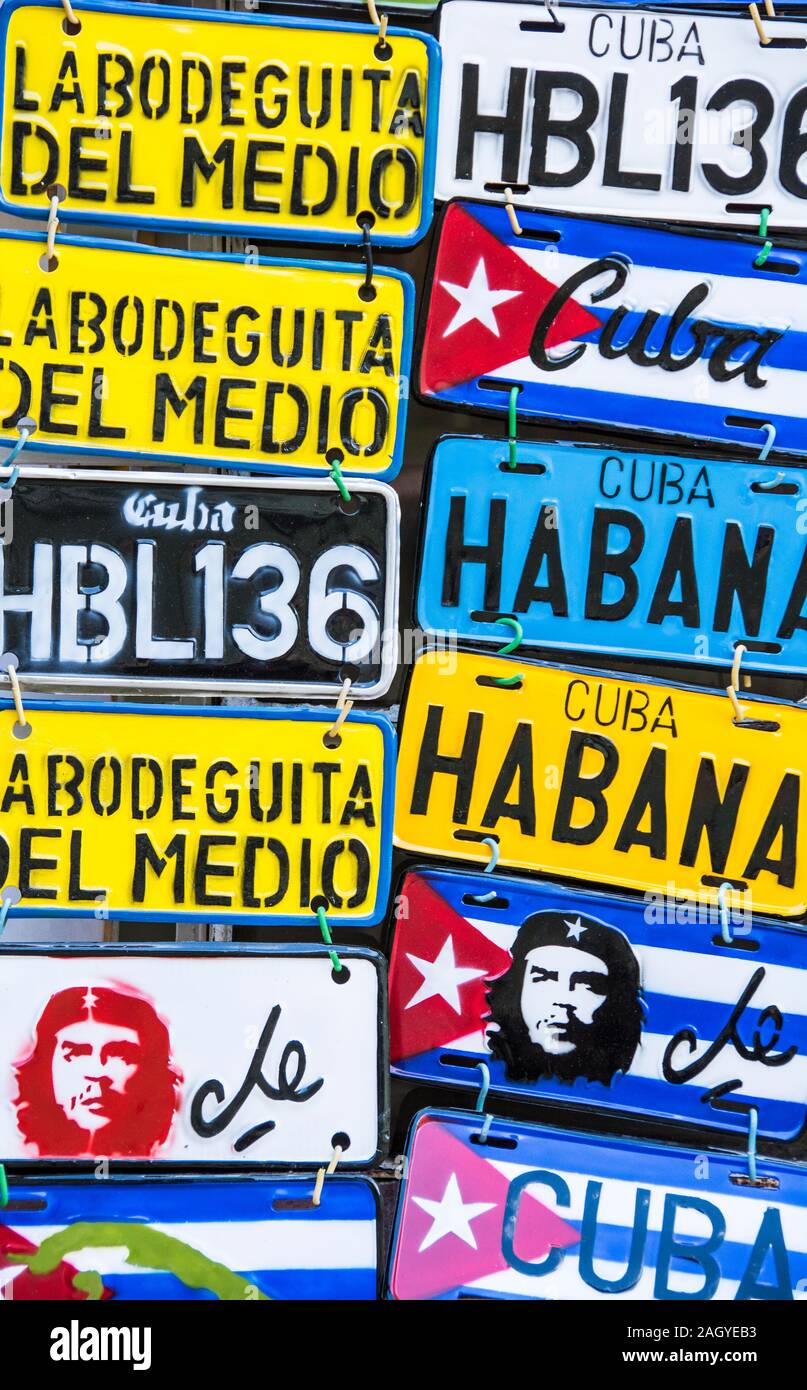 A grouping of vintage, Cuban car license plates for sale in the Old