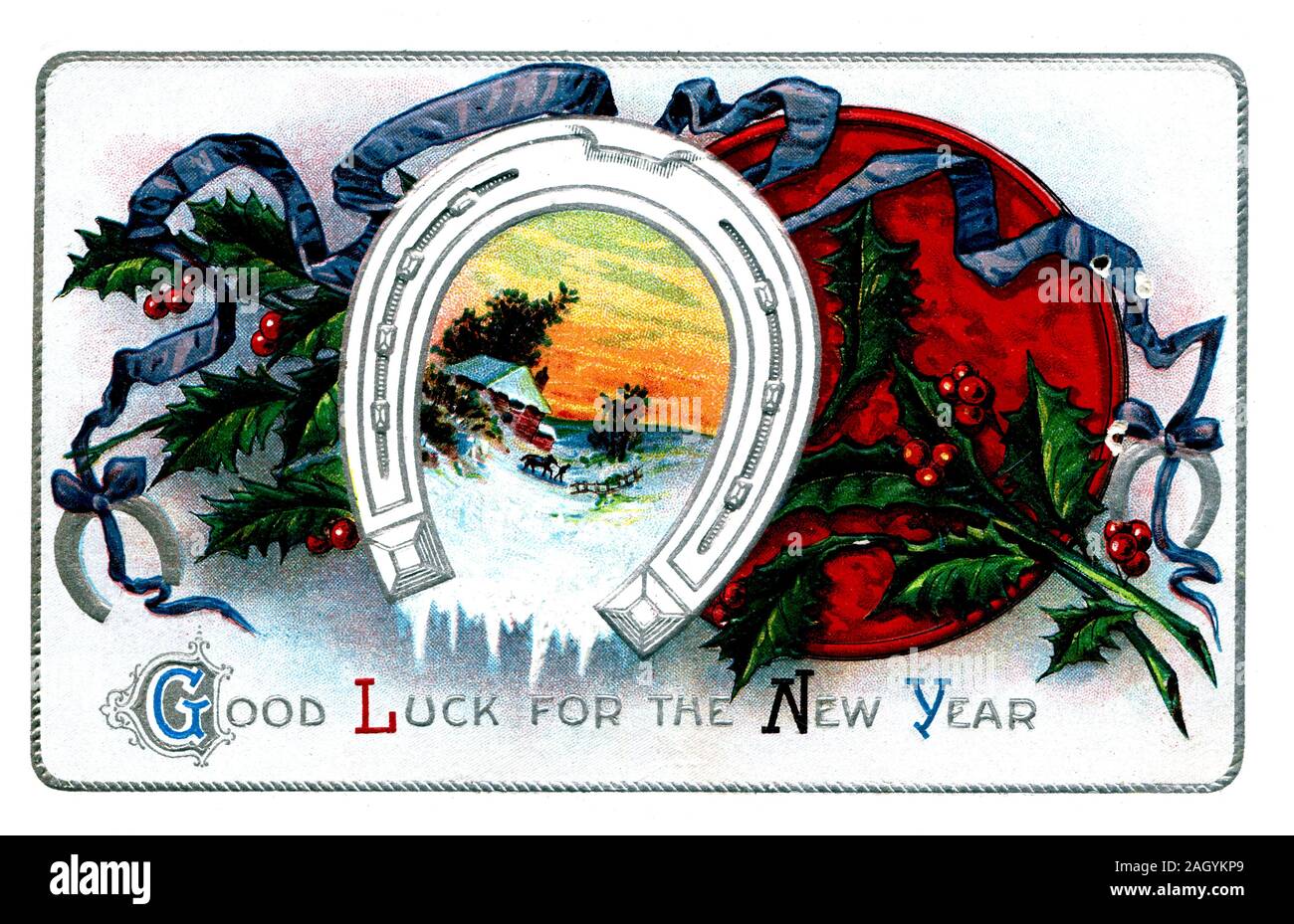 Vintage Postcard, Antique Greeting card, Good Luck for the New Year, horseshoe, ribbons, house in snow scene Stock Photo