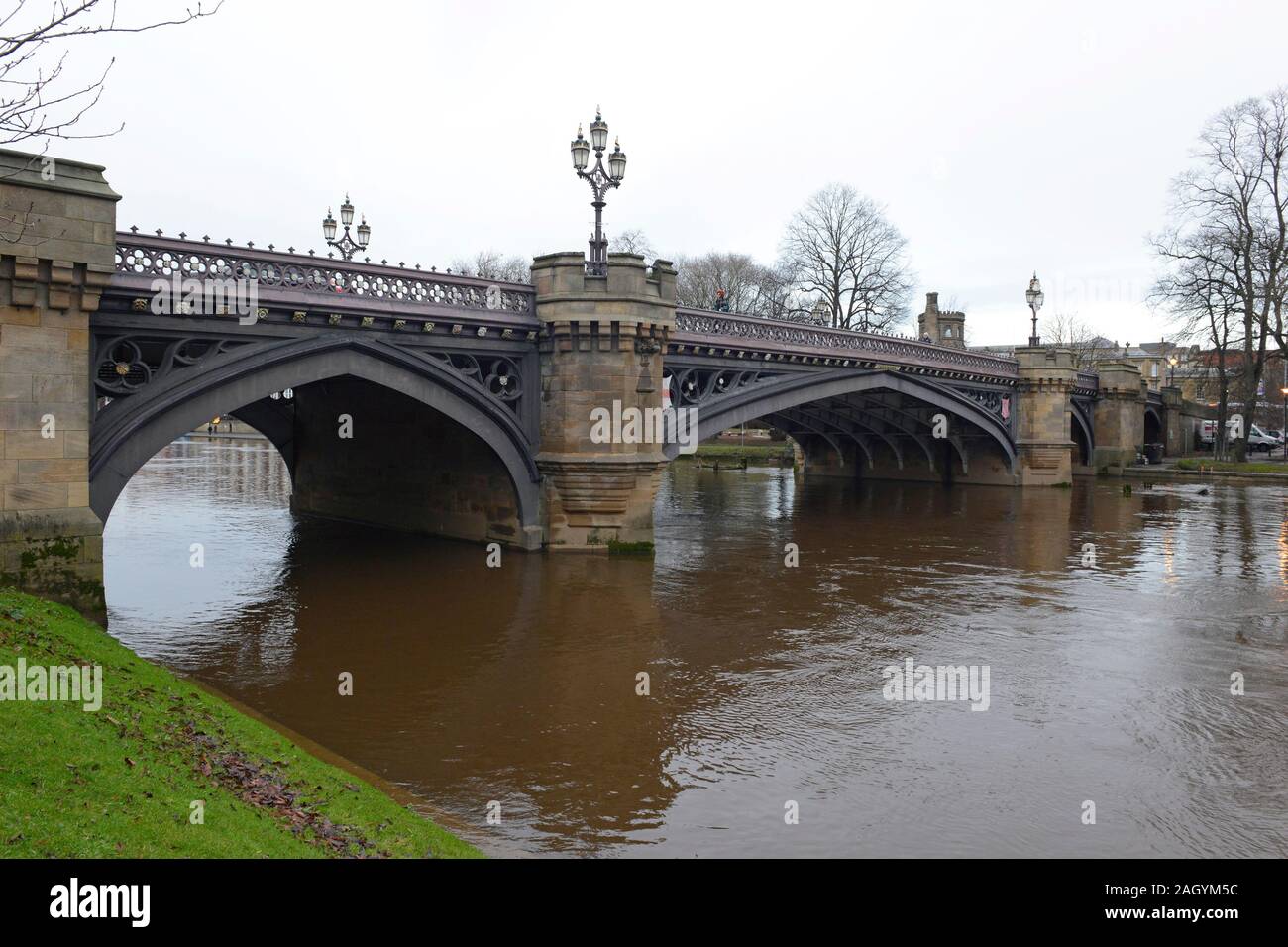 Skeldergate bridge with the swollen river Ouse running high on a mid December afternoon in York, UK. Stock Photo