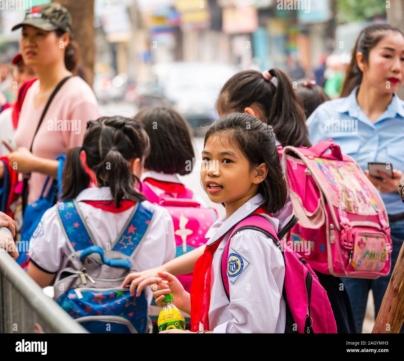 Vietnamese schoolgirls wearing uniform on school outing, Hanoi, Vietnam, Asia Stock Photo