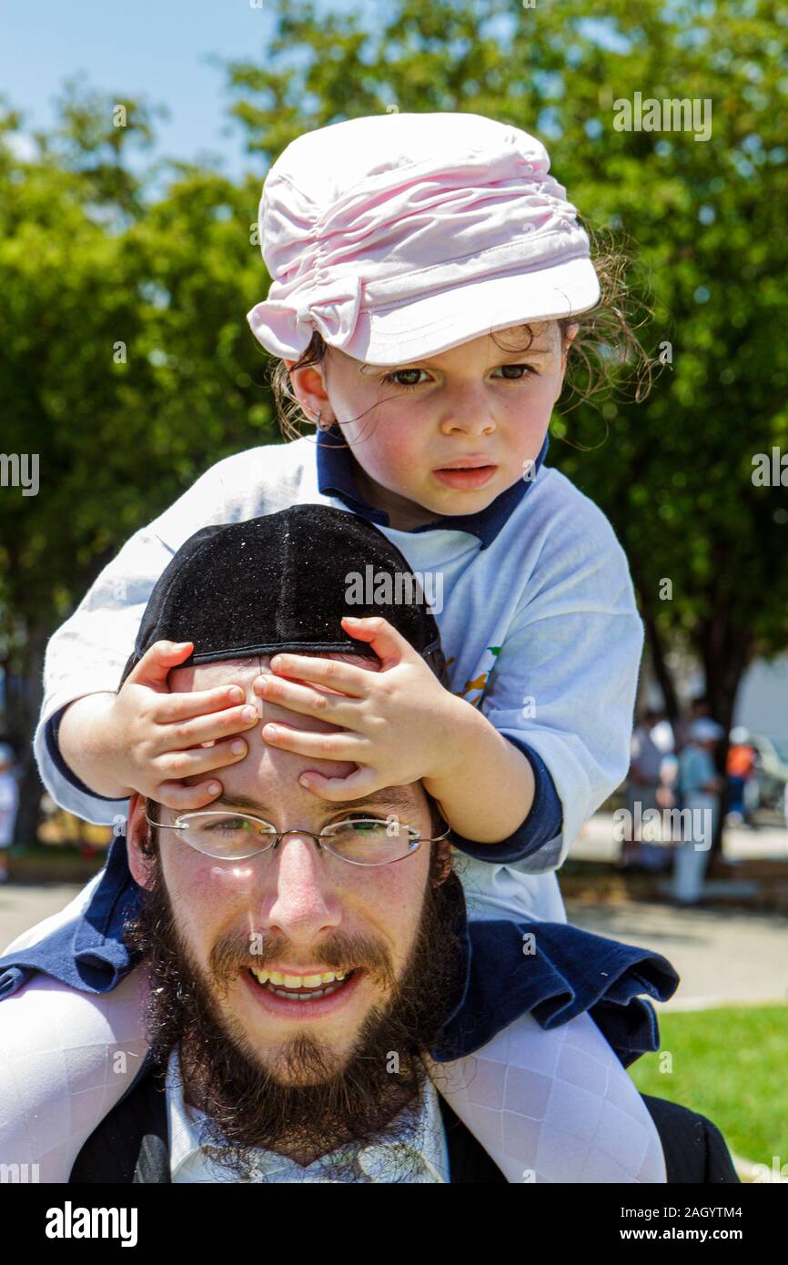 Miami Hallandale Florida,South Florida Jewish Community,Lag B'omer Jewish Unity Parade & Fair,Jew,man men male,father,parent,parents,girl girls,youngs Stock Photo