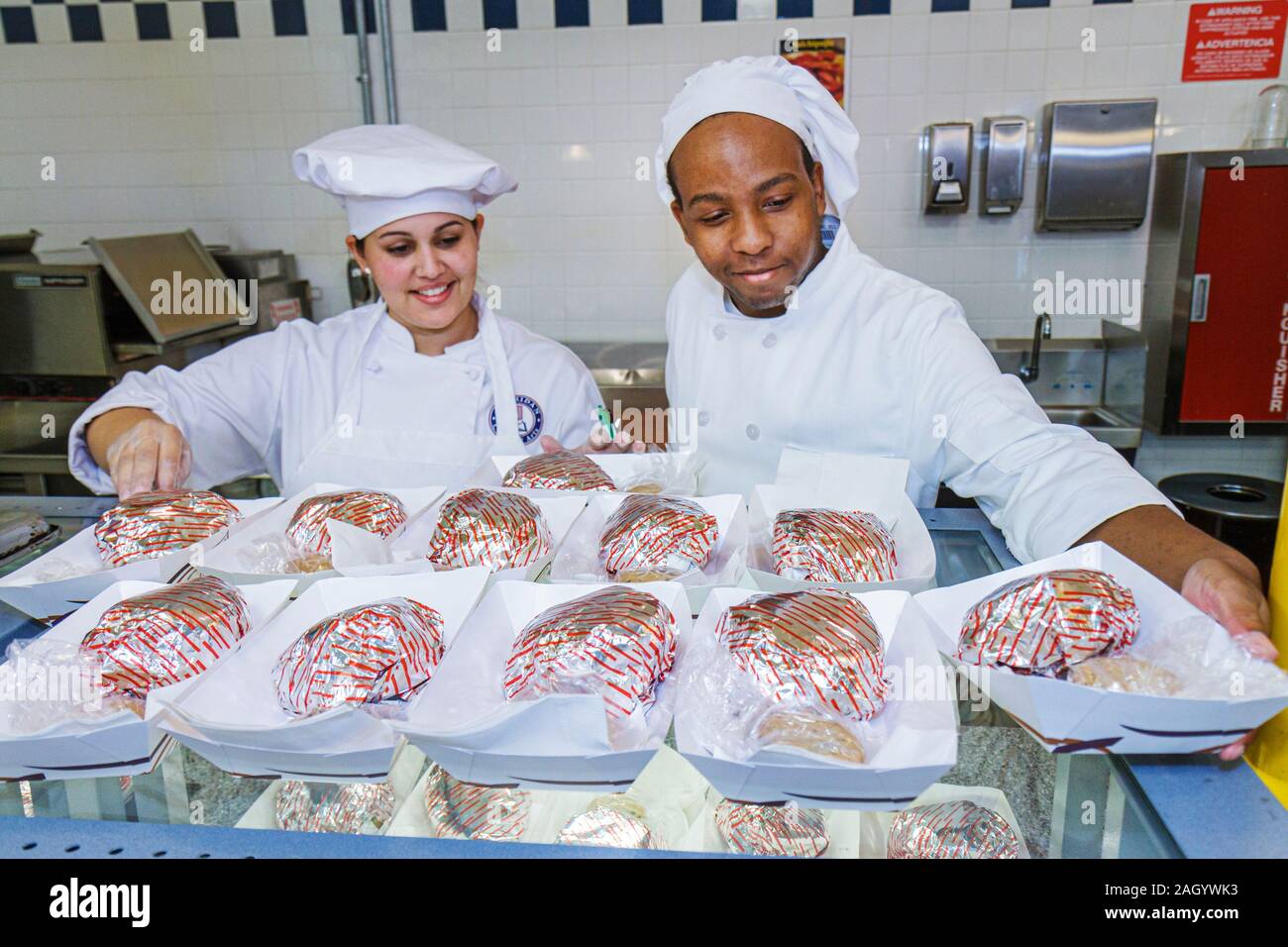 Hollywood Florida,Sheridan Technical Center,cook,chef,student students Black male,female,cafeteria,food,FL100515216 Stock Photo